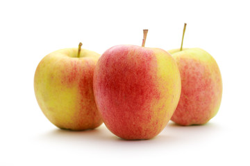 Three fresh apples on white background