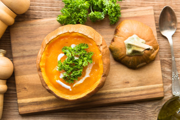 Bowl of spicy pumpkin soupwith coconut milk