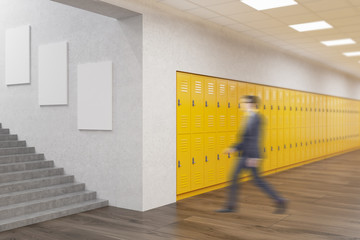 Teacher in school corridor