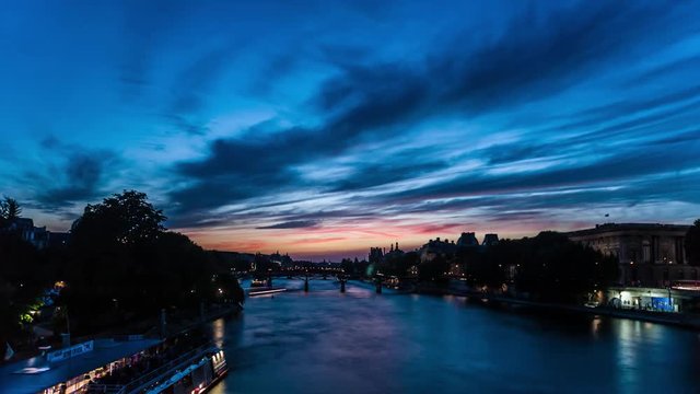 Beautiful lovely sunset over the Seine river in Paris, France