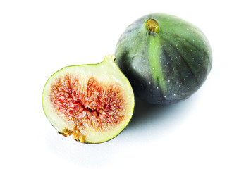 Whole fresh figs and one slice of fig