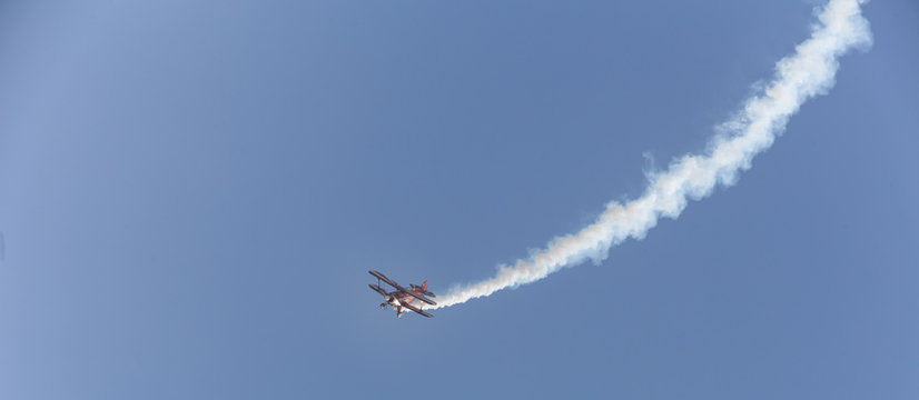 Stunt Flyer Airplane In The Sky