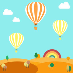 Fototapeta premium Balloons flying over the autumn landscape
