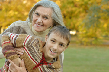 Fototapeta premium Grandmother with boy in park