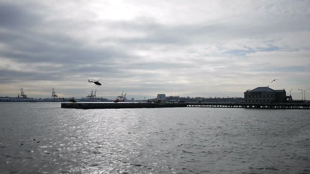 Clip of an helicopter taking off in New York.