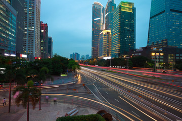 Fototapeta premium Empty road surface floor with modern city landmark architecture