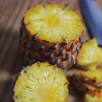 slices pineapple cut knife
