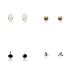 Set of the four pairs of diamond earrings isolated on white