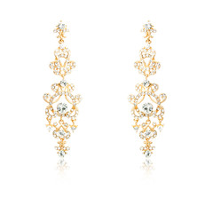 Pair of golden diamond earrings isolated on white