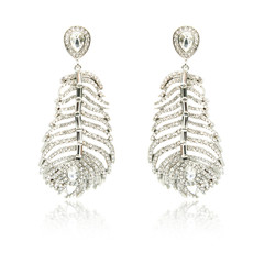 Pair of silver diamond earrings isolated on white