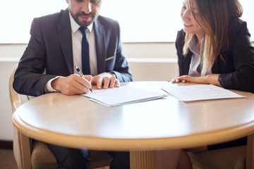Businesswoman closing a deal with client
