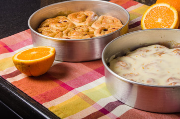 Pan of fresh baked iced sweet rolls