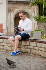 Photographer working on a laptop