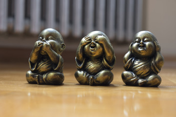 Three Wise Buddha See Hear Speak No Evil Statue on the floor