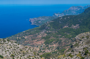 Fototapeta premium Panorama of Deia from the Tramuntana mountains, Baleares, Spain