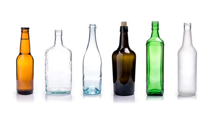 Glass bottles of mixed colors including green, clear white, brow