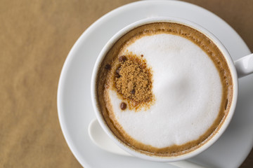 A hot coffee in cup.
