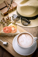 Coffee cup and sandwiches