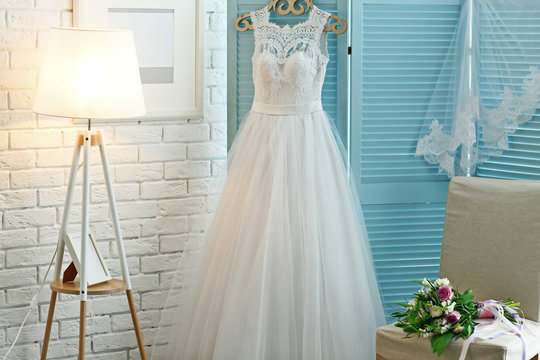 Beautiful Wedding Dress On Hanger In Room