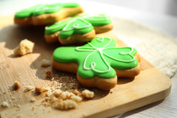 Decorative cookies on cutting board. Saint Patrics Day concept