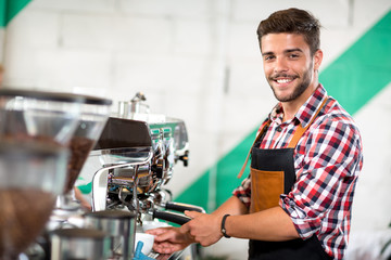 Waiter pours coffee