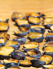 Sun dried blue plum background