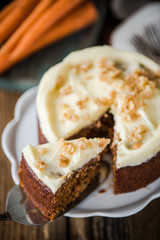 slicing carrot cake, natural light