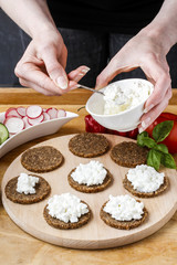 Obraz na płótnie Canvas Fresh bread with cottage cheese and vegetables