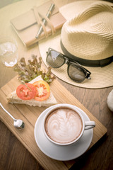 Coffee cup and sandwiches