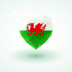 Flag of Wales in shape diamond glass heart. Triangulation style