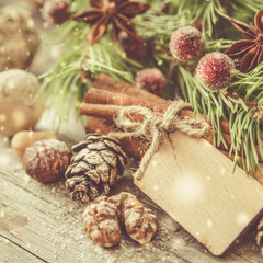 Christmas decorations on rustic wood background