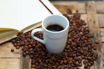 white cup with hot coffee
