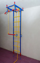 Children's wall bars with horizontal bar, rings and rope