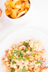 Scrambled eggs with chanterelle and parsley