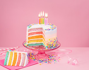 Colorful Birthday Cake over pink - 118764583