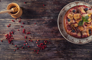 Berry cake with nuts on the table
