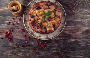 Berry cake with nuts on the table
