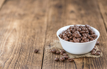 Old wooden table with Chocolate Raisins