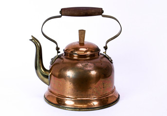 Old, worn copper teapot