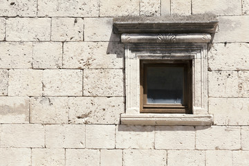 Fototapeta na wymiar old stone house window