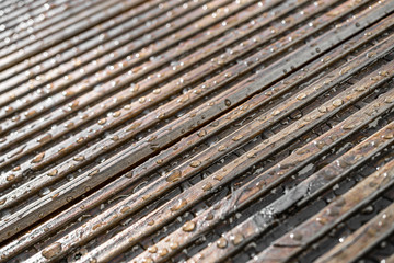 Wassertropfen auf Terrasse abweisend 