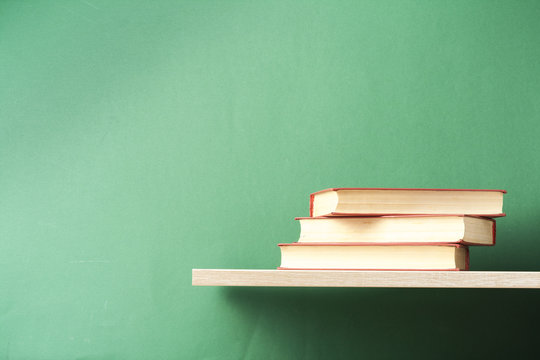 Stack of colorful books. Education background. Back to school. Copy space for text.