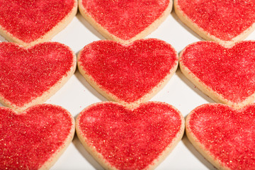 Fototapeta na wymiar heart shaped cookies, arranged for Valentine's Day, close up, isolated, horizontal