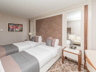 Fototapeta premium Modern hotel room with big bed