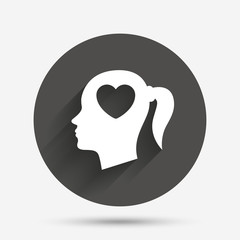 Head with heart sign icon. Female woman head