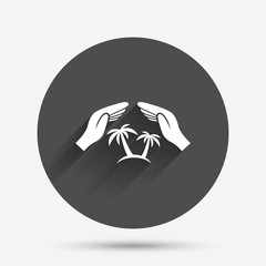 Travel insurance sign. Hands protect cover tree.