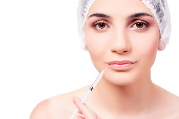 Young woman preparing for plastic surgery isolated on white