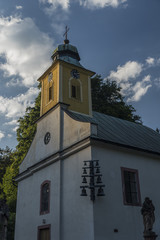 Church with tower and cross in Krkonose mountains