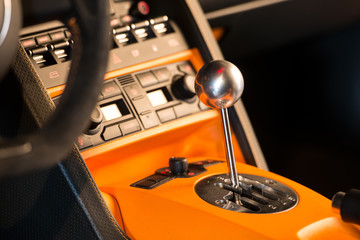 Closeup photo of sport car 6 speed manual gearstick..