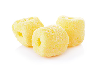 Crunchy corn snacks on a white background
